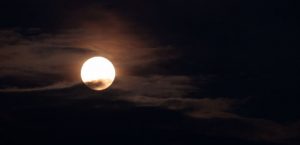 bright moon in dark sky